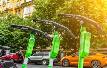 Electric Scooters Available for Rent on City Street.
