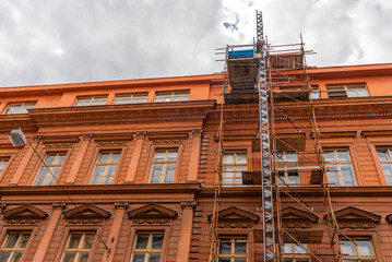 Historic Building Renovation Scaffoldings and Construction Hoist.