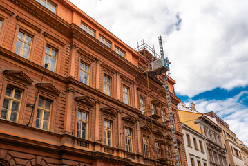 Historic Building Renovation Scaffoldings and Construction Hoist.