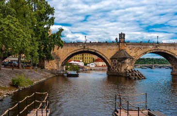 Iconic Charles Bridge Stone Arches Over Vltava River.