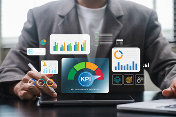 KPI dashboard interface on digital tablet showing business performance metrics, charts, and AI tools used by professional manager in office for data analysis and strategic planning
