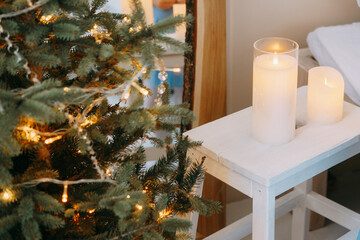 Christmas tree decorated with warm lights and clear crystal garland for a festive winter holiday season display.