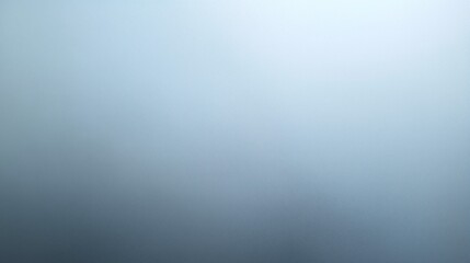 Soft gradient background in cool gray blue tones with subtle blur and foggy effect. Minimal abstract surface ideal for design, presentations, banner use, copy space, and modern visuals.
