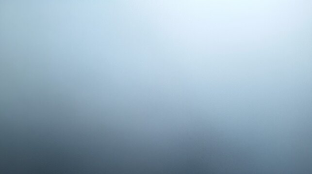 Soft gradient background in cool gray blue tones with subtle blur and foggy effect. Minimal abstract surface ideal for design, presentations, banner use, copy space, and modern visuals.