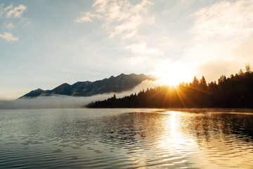 Calm Lake at Sunrise in Summer