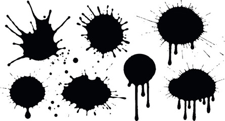 Fototapeta premium Black ink blots, splatters, and drips form a set of grunge design elements