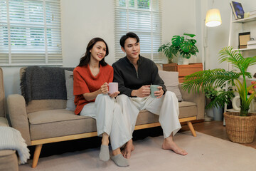 Obraz premium eading, streaming, coding. Their modern, happy relaxation routine at home.