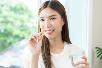 Dietary supplement, asian young woman, girl hand holding fish oil pills, drugs medical, take or eat...