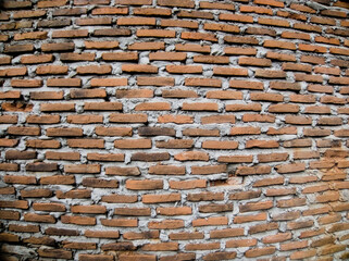 Red brick wall texture with gray mortar background