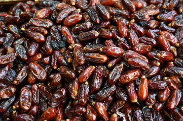 Dates for sale in the market. Close-up of dates.