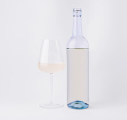 Elegant bottle of white wine beside a glass ready for serving
