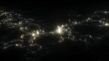 Nighttime satellite view of illuminated urban areas and city lights across a region
