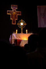 Adoration of the Blessed Sacrament during a Catholic youth event.