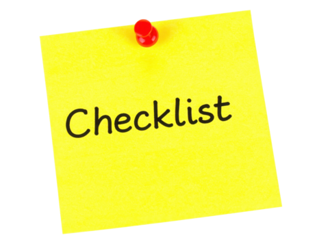 A bright yellow sticky note with the word "Checklist" written in bold black letters.