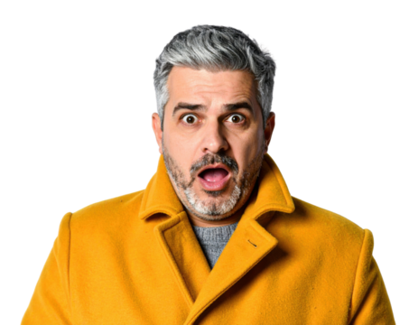 A surprised man with gray hair wearing a bright yellow coat expresses shock or disbelief.
