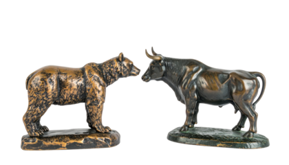 A detailed sculpture pair of a bear and a bull, symbolizing market trends and opposing forces in finance.
