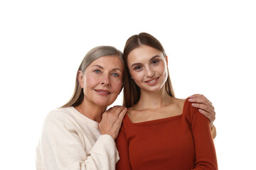 Mother hugging her daughter on white background
