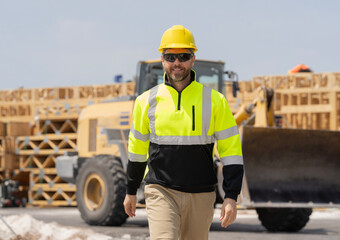 Builder civil engineer at building. Supervisor engineer. Worker at construction site. Builder construction man. Worker supervisor at heavy machinery. Industry worker at construction. Site manager