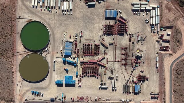 Aerial view of unconventional oil and gas extraction (shale oil) in A&ntilde;elo, Neuqu&eacute;n. Fracking equipment. Overhead view