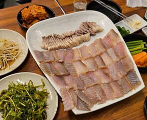 rTraditional Korean Cuisine Samhap: Sliced Raw Fish and Boiled Pork Belly with Side Dishes