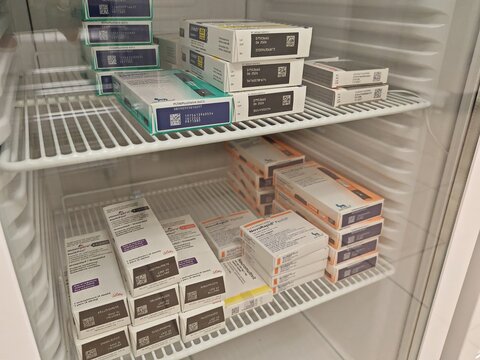 Prague,Czech Republic-October 4 2025: Pharmacy refrigerator fully stocked with thermolabile medications like vaccines and insulin pens.	
