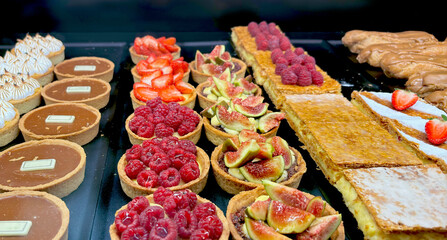 A display case with assorted desserts