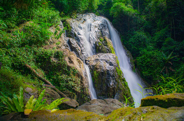 A gorgeous waterfall captured in long exposure, Punjaban Waterfall, national park, Ranong, Thailand.