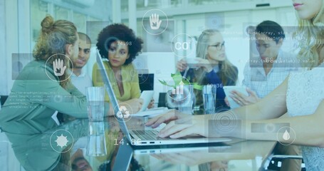 Team of five professionals discussing metrics in conference room, with laptops and data overlays