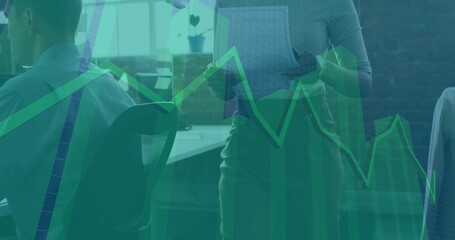 Standing adult woman holding tablet in open-plan office with data overlay and plant, copy space