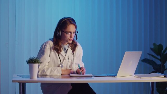 Emergency Medical Hotline. Female Doctor in Headset Providing Urgent Medical Consultation, Coordinating Ambulance Response and Ensuring Healthcare Support Through Telemedicine System.