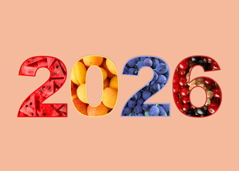 Numbers 2026 with fruits inside on pink beige background. New Year card