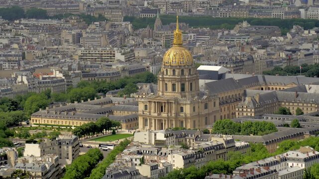Stunning aerial perspective showing the golden dome of Les Invalides, a famous historical landmark and UNESCO World Heritage site, rising above the classic architecture of the Parisian cityscape