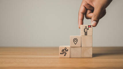 Minimalist business success concept showing teamwork, goal achievement, and leadership represented by wooden blocks and symbolic icons.