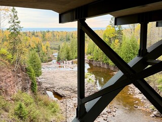 under a bridge looking out onto lake superior in minnesota