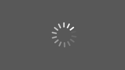 Spinning radial circular loading indicator animation on a dark gray background with copy space