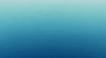 Obraz premium Still water surface background texture with small ripples and calm blue gradient colors serene minimalist ocean view tranquil abstract