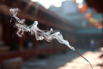 Macro incense smoke drifting through light
