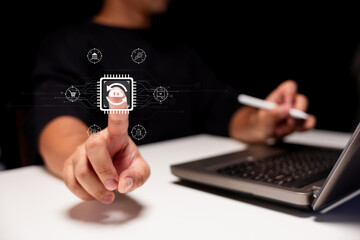 A person interacts with a digital interface displaying a microchip and icons, symbolizing technology and innovation.