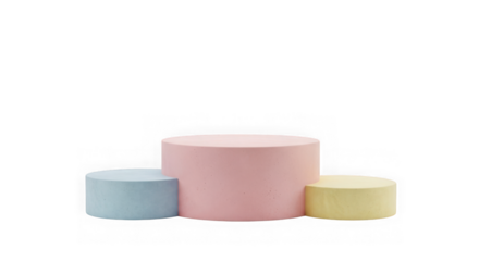 Three pastel colored cylindrical stools on a black background