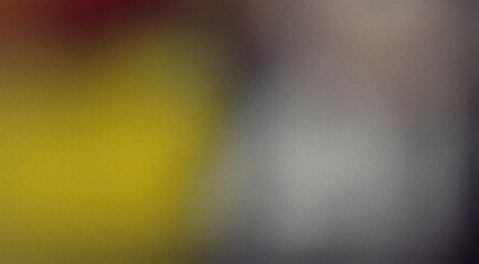 Abstract grainy background with yellow, gray, and red color gradient.