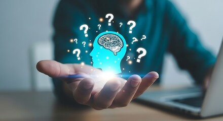 Person holding glowing head silhouette with brain and question marks in the air thinking