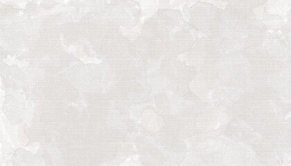 Soft beige watercolor wash on canvas fabric texture creating an elegant artistic background.