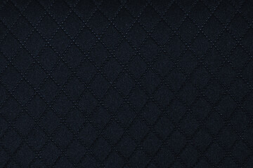 Dark textured background with subtle speckles and gradients