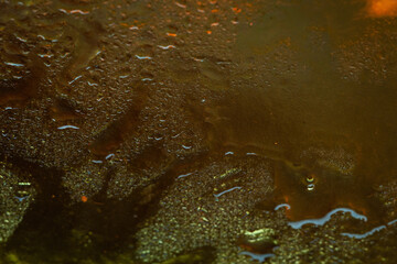 Wet texture. Abstract texture with a color gradient. Abstract background with water drops. Selective focus