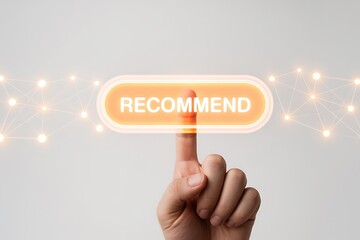 Hand pushing an orange glowing button labelled recommend surrounded by lights