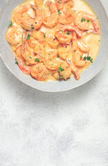 shrimp in creamy garlic sauce, with spices and herbs,