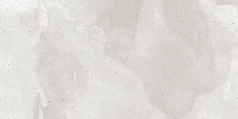 Beige watercolor paper texture with natural stains and organic fibers creating a vintage artistic background.