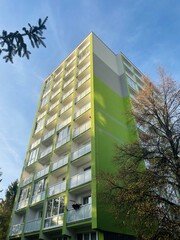 Vertical multi storey panel residential buildings in an urban area. Architecture representing housing development, real estate, and city infrastructure.