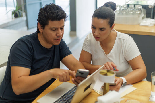Couple Working Together in a Modern Bakery Cafe