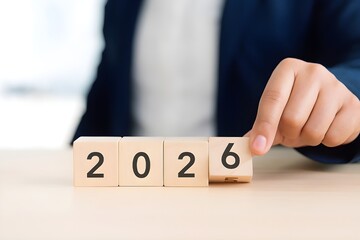 Transition from 2025 to 2026 new year goals, business planning, fresh beginnings, and success achievement concept